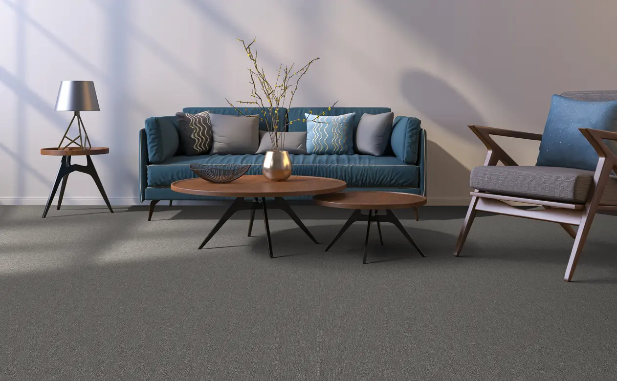 gray carpet with blue sofa